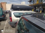 Автобокс MaxBox Pro 700 XL черный матовый + багажник Futura на Lada Largus- фото2